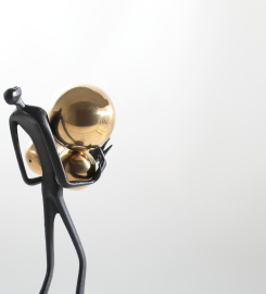 Holding Ball Sculpture in Black & Gold, Crafted from Tin-Alloy, S/S Steel, & Iron